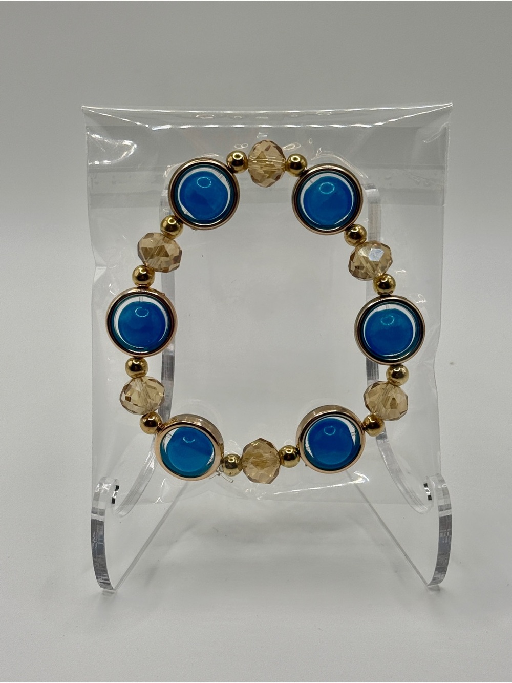 Blue Cabochon and Gold Bead Stretch Bracelet
